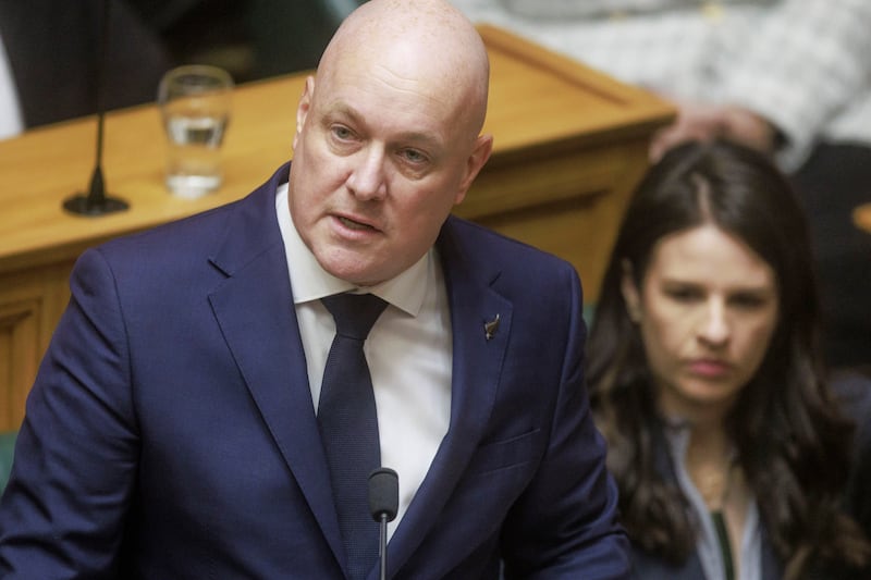 New Zealand Prime Minister Christopher Luxon makes a ‘formal and unreserved’ apology in Parliament (Robert Kitchin/Stuff/AP)