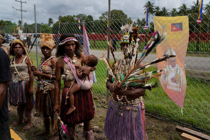 People wait for Pope Francis to arrive in Vanimo, Papua New Guinea (Gregorio Borgia/AP)