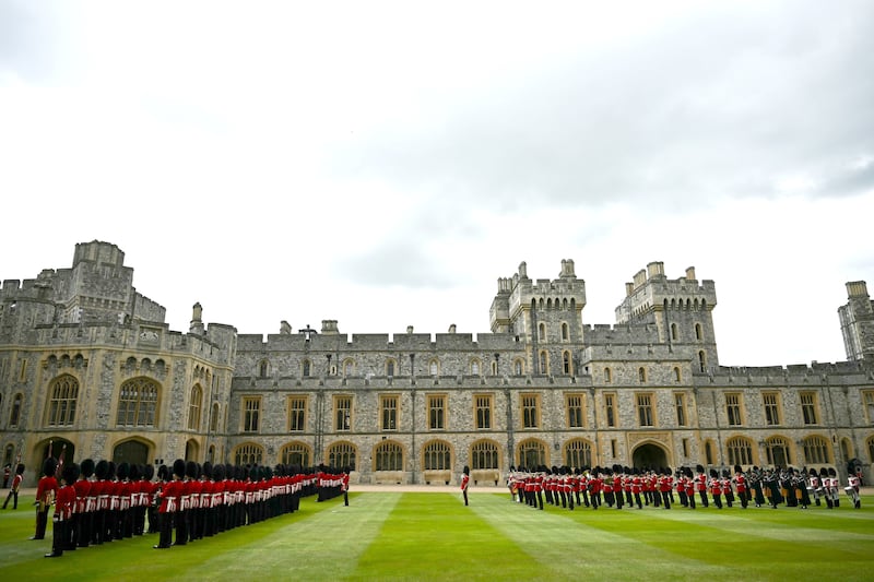 Irish Guards line up prior to the presentation of new colours at Windsor Castle, Berkshire