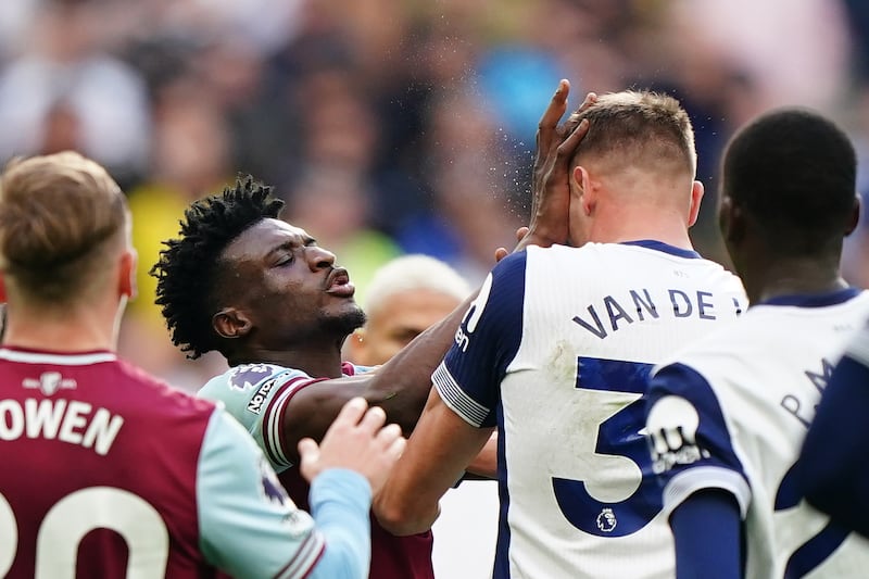 West Ham’s Mohammed Kudus raises his hands to Micky van de Ven’s face and received a red card after a VAR check