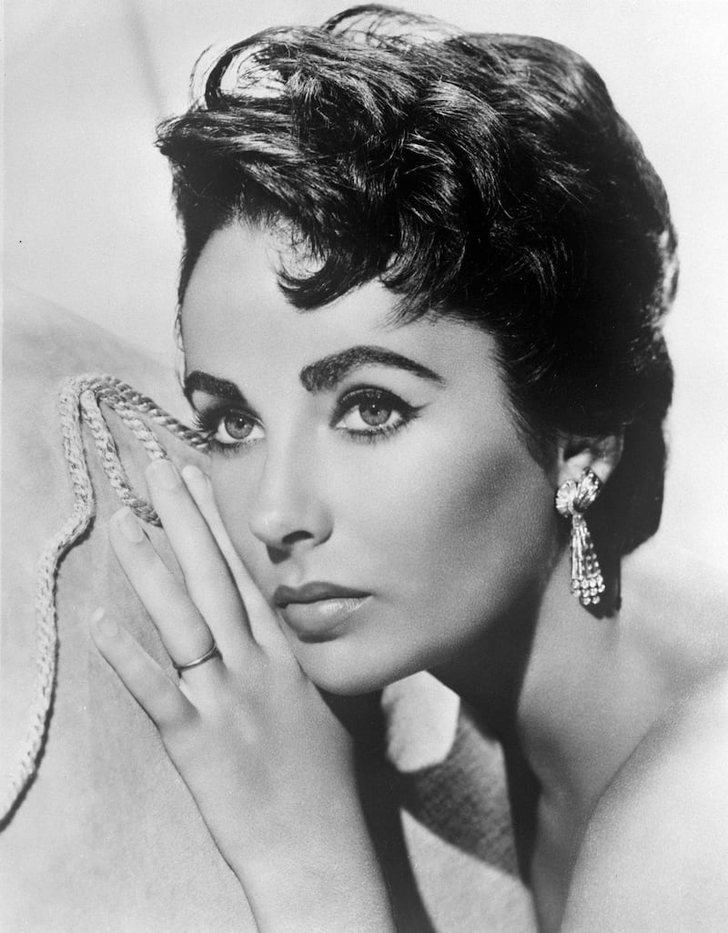 Actress Elizabeth Taylor was known for portraying Cleopatra on the big screen