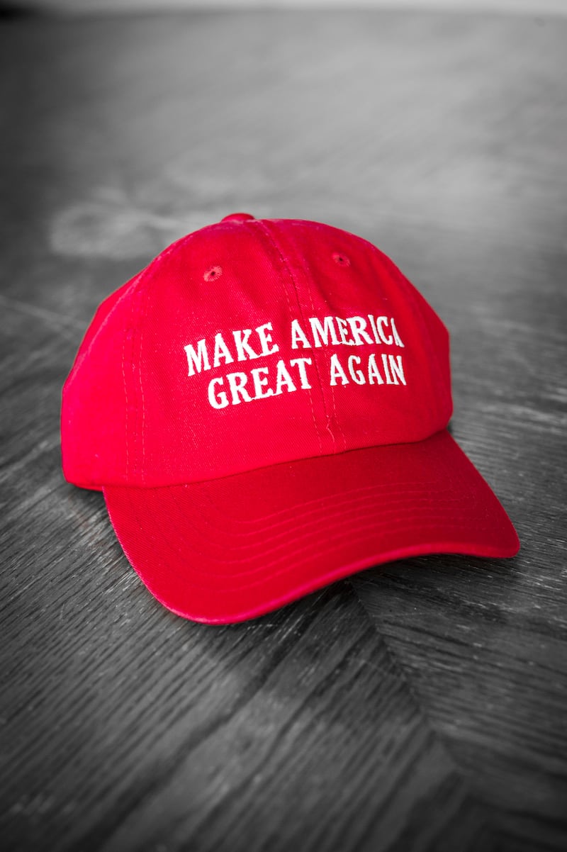 A red Make America Great Again hat