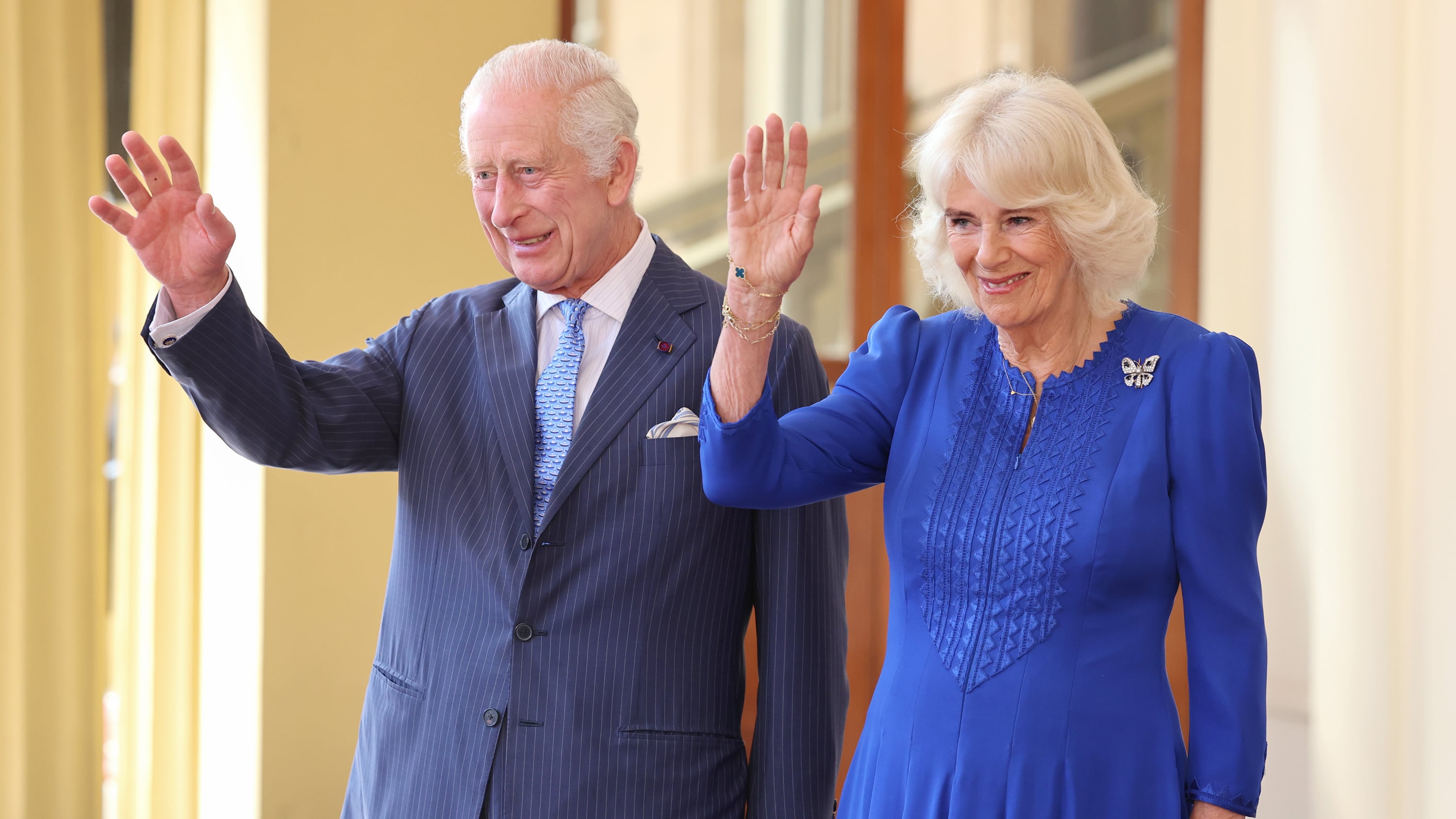 King Charles III and Queen Camilla wave and smile as they formally bid farewell to Emperor Naruhito and his wife Empress Masako of Japan as they leave Buckingham Palace, on the final day of their state visit to the UK
