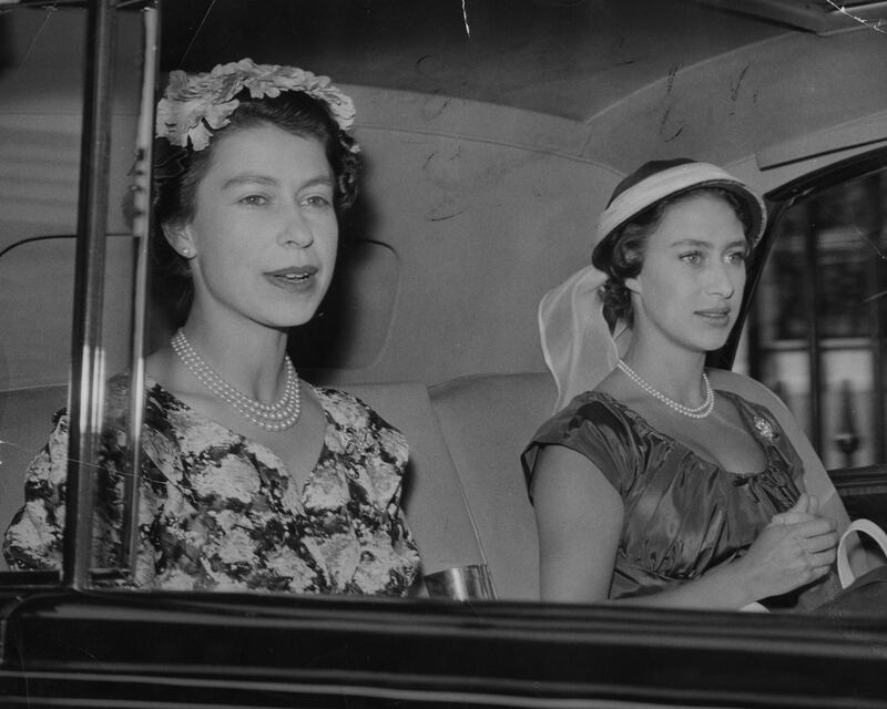 The late Queen (L) wore florals to Ascot in 1955