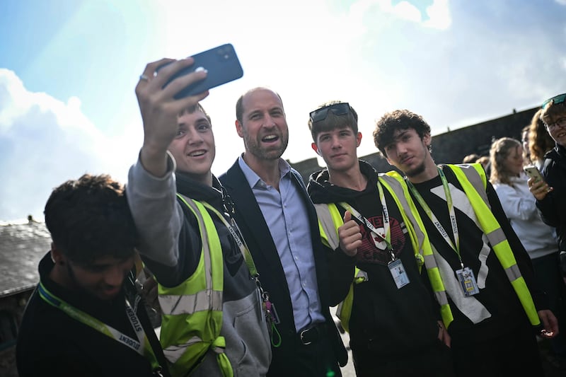 Students take a selfie with William at Duchy College in Cornwall