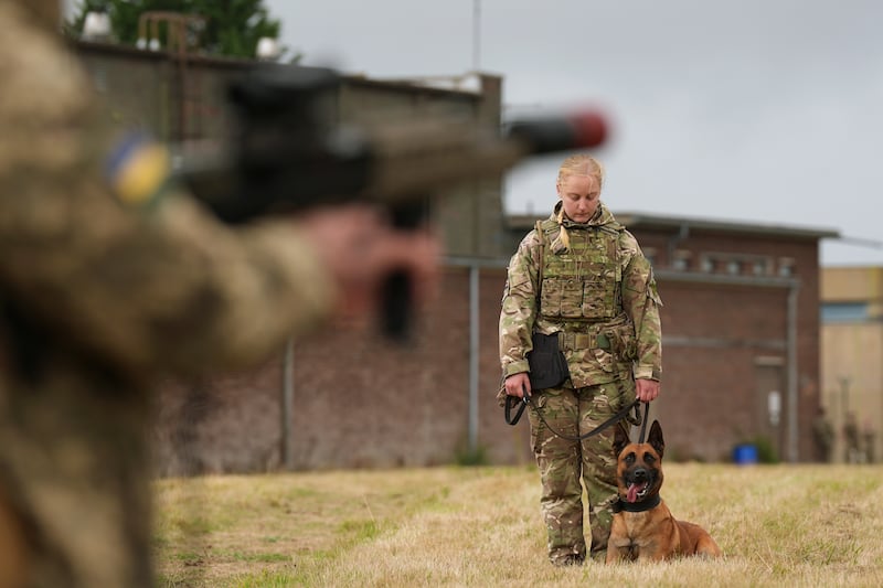 Private Freya Brown with her military working dog Zac during a training session