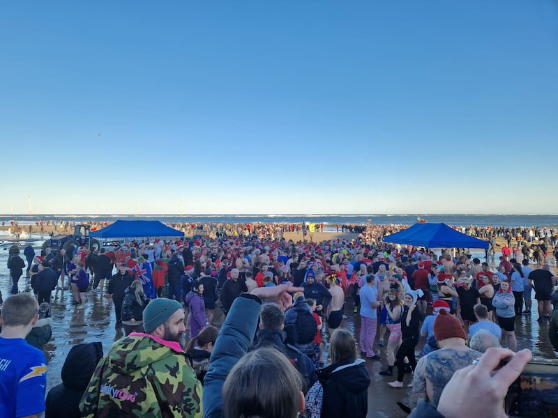 People taking part in a Boxing Day swim in Redcar