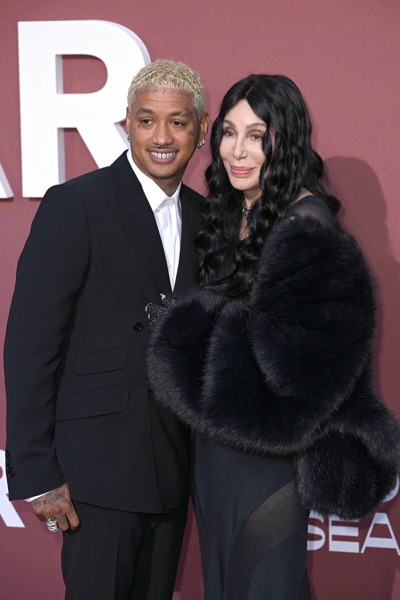 Alexander ‘AE’ Edwards and Cher attending the 30th edition of the amfAR Gala