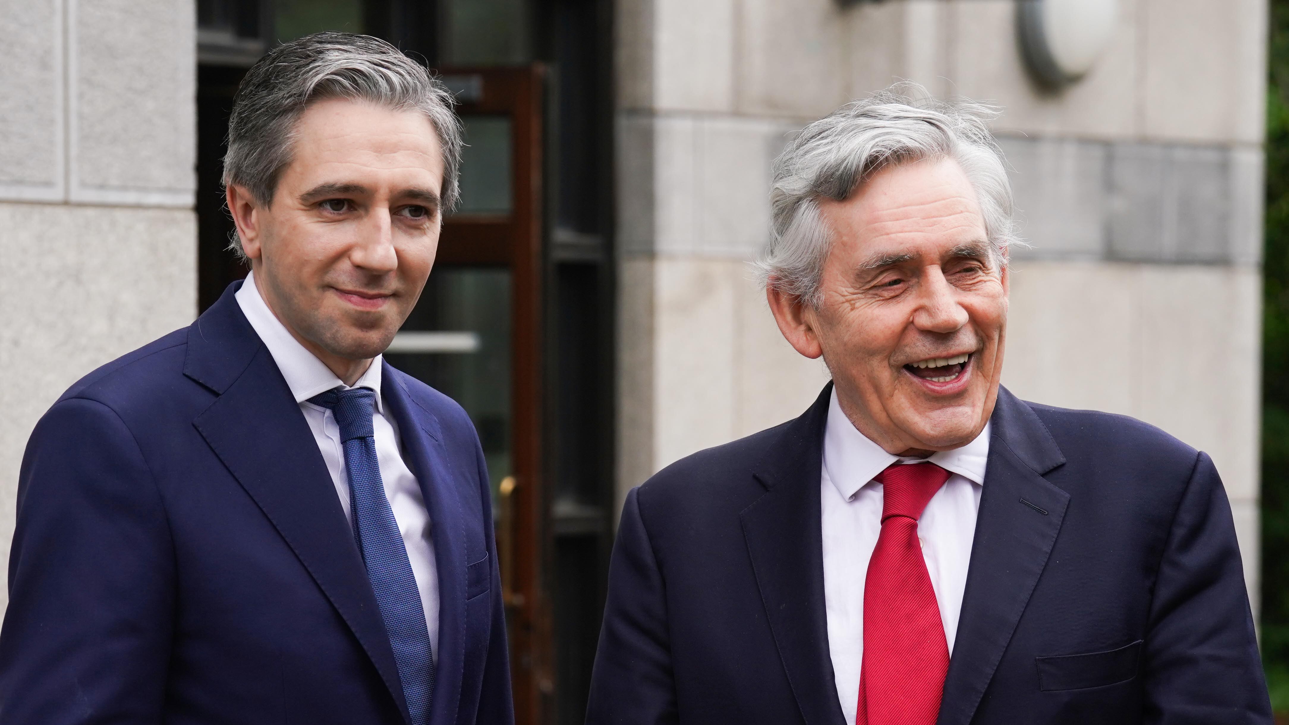 Taoiseach Simon Harris (left) and former UK prime minister Gordon Brown arrive at the inaugural Child Poverty and Well-being Summit at Hibernia Conference Centre, Dublin Castle