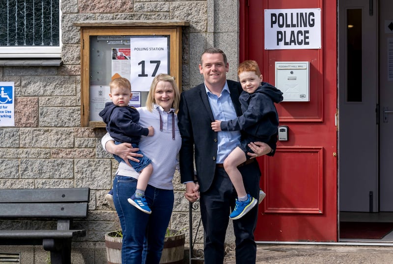 Scottish Conservative leader Douglas Ross arrived with his family to cast his vote