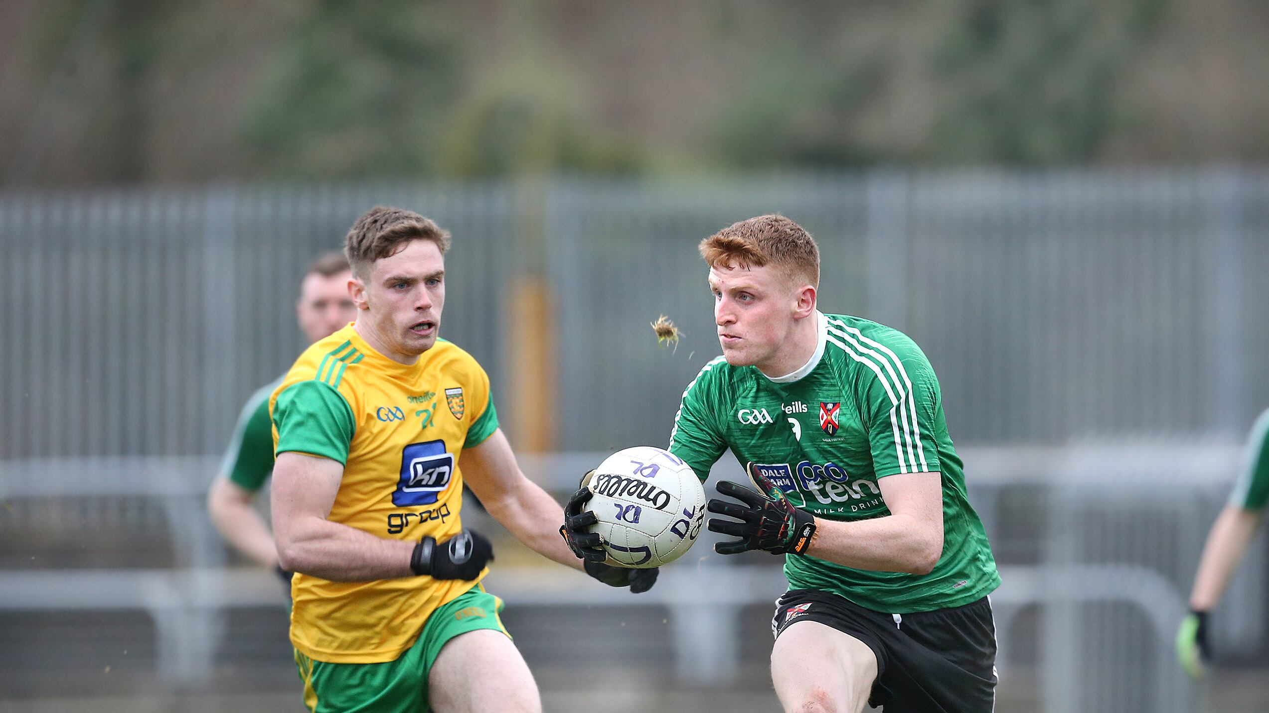 30-12-2018: Donegal Ciaran Diver with Ruairi Campbell of Queens during the McKenna Cup match at Ballybofey on Sunday. Picture Margaret McLaughlin