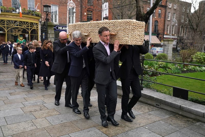 The coffin of Charlie Bird arrives for a service at Mansion House in Dublin to celebrate the life of the former RTE correspondent