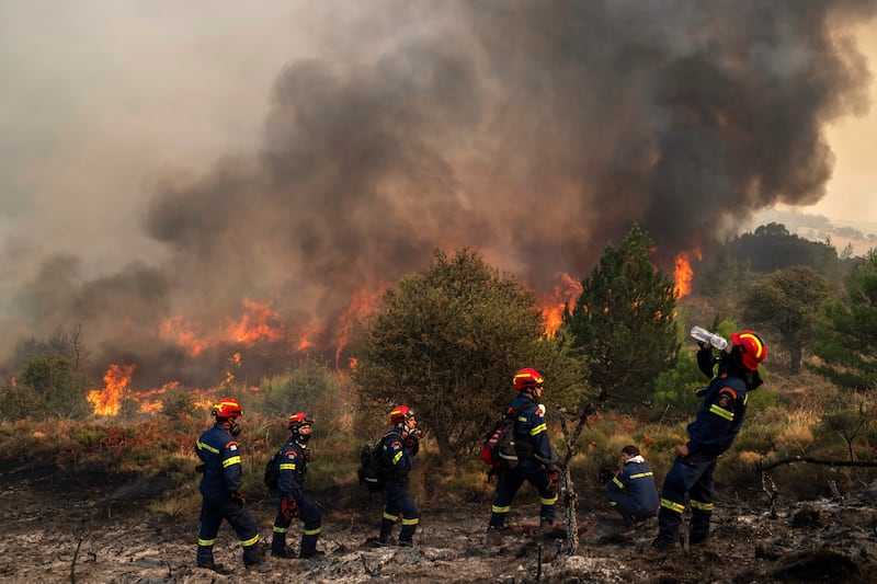 This year’s fire season had been flagged as the most dangerous in two decades (Petros Giannakouris/AP)