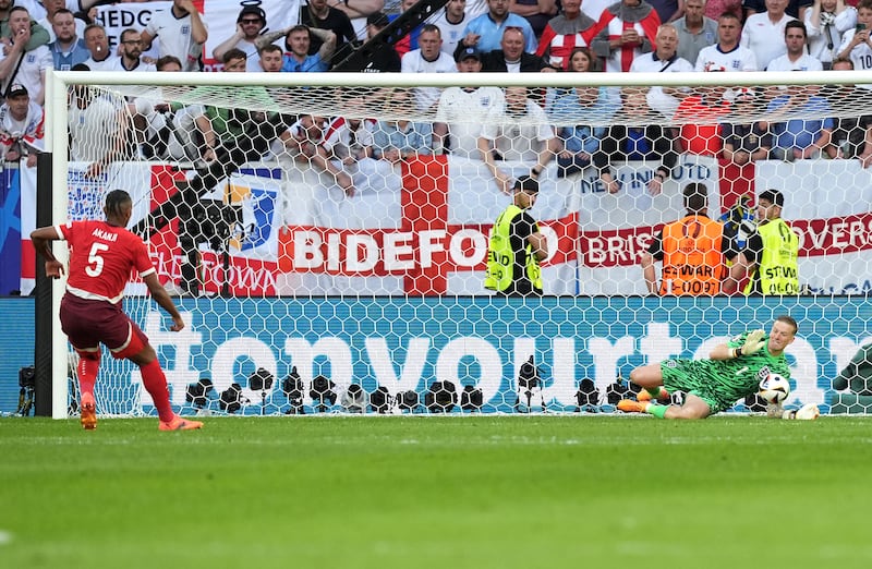 Jordan Pickford saved Manuel Akanji’s penalty