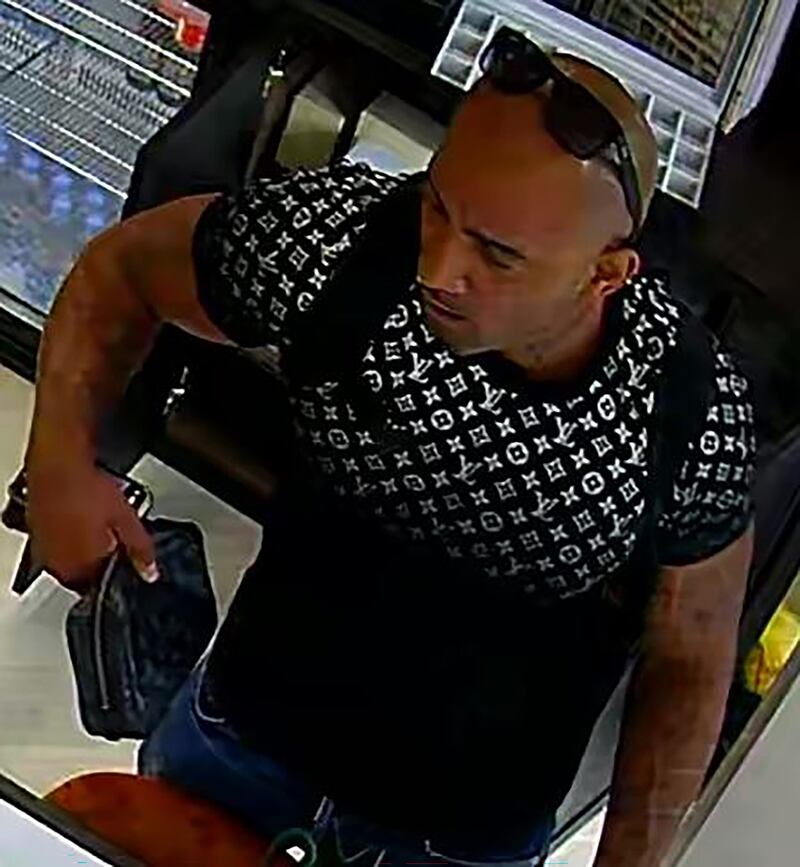 One of two unarmed men who stole a number of high-value watches from the shop in Kew Road, Richmond