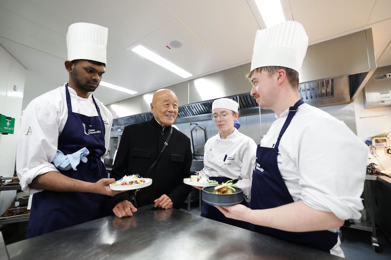 Ken Hom shared his wisdom and insight with aspiring chefs at Ulster University's Academy Restaurant during his visit to Belfast