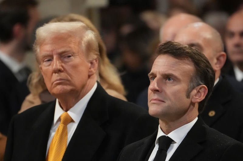 President-elect Donald Trump with French President Emmanuel Macron in Notre Dame Cathedral (Thibault Camus/AP)