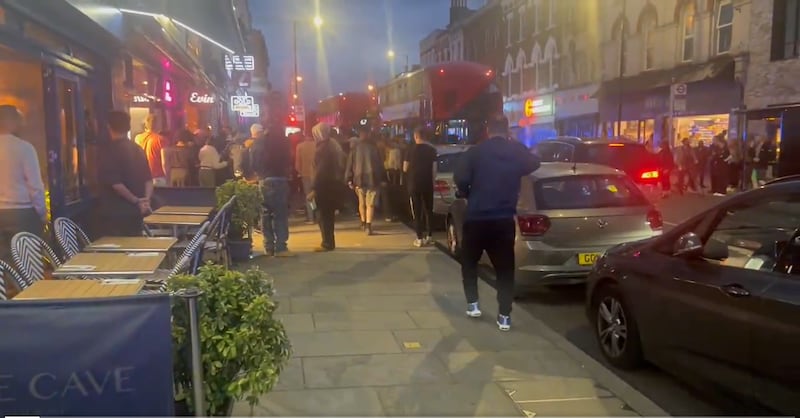 Ayo Adesina filmed the moment crowds gathered and police cars lined in the street on Kingsland High Street, Hackney (Ayo Adesina)