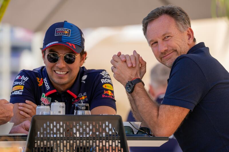Christian Horner, right, in Bahrain for last weekend’s Formula One testing (Darko Bandic/AP)