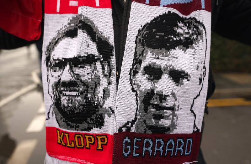 Scarves depicting Liverpool manager Jurgen Klopp and Aston Villa manager Steven Gerrard prior to a Premier League game between the sides at Anfield