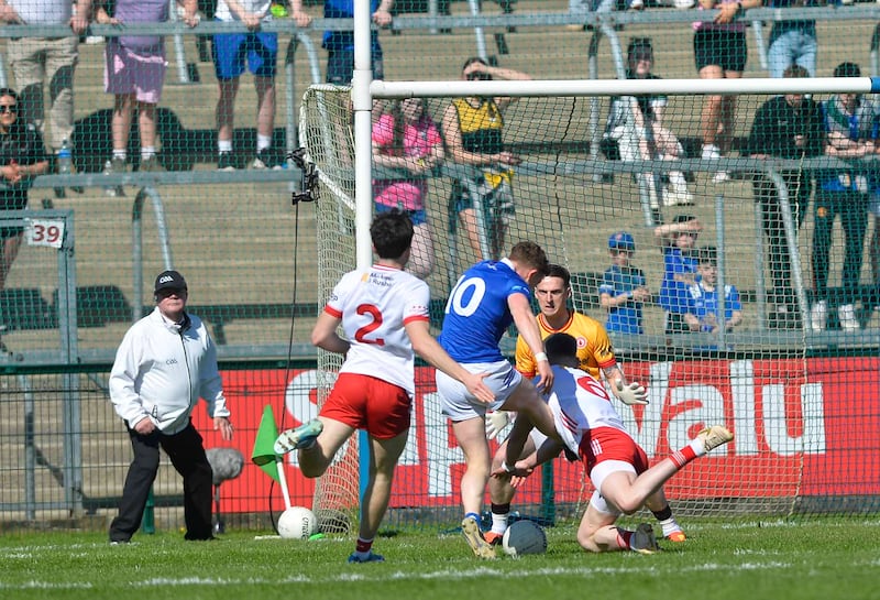 Mattie Donnelly makes a brilliant early block to deny Ciaran Brady. Picture: Mark Marlow