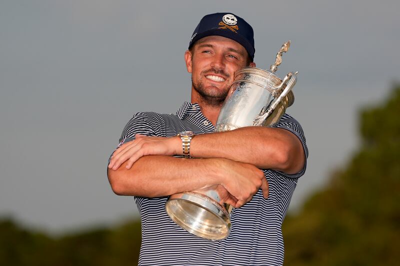 Bryson DeChambeau holds the trophy after winning the US Open at Pinehurst (George Walker IV/AP)