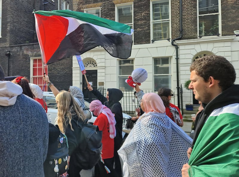 People taking part in a pro-Palestine march in central London organised by the Palestine Solidarity Campaign and other groups