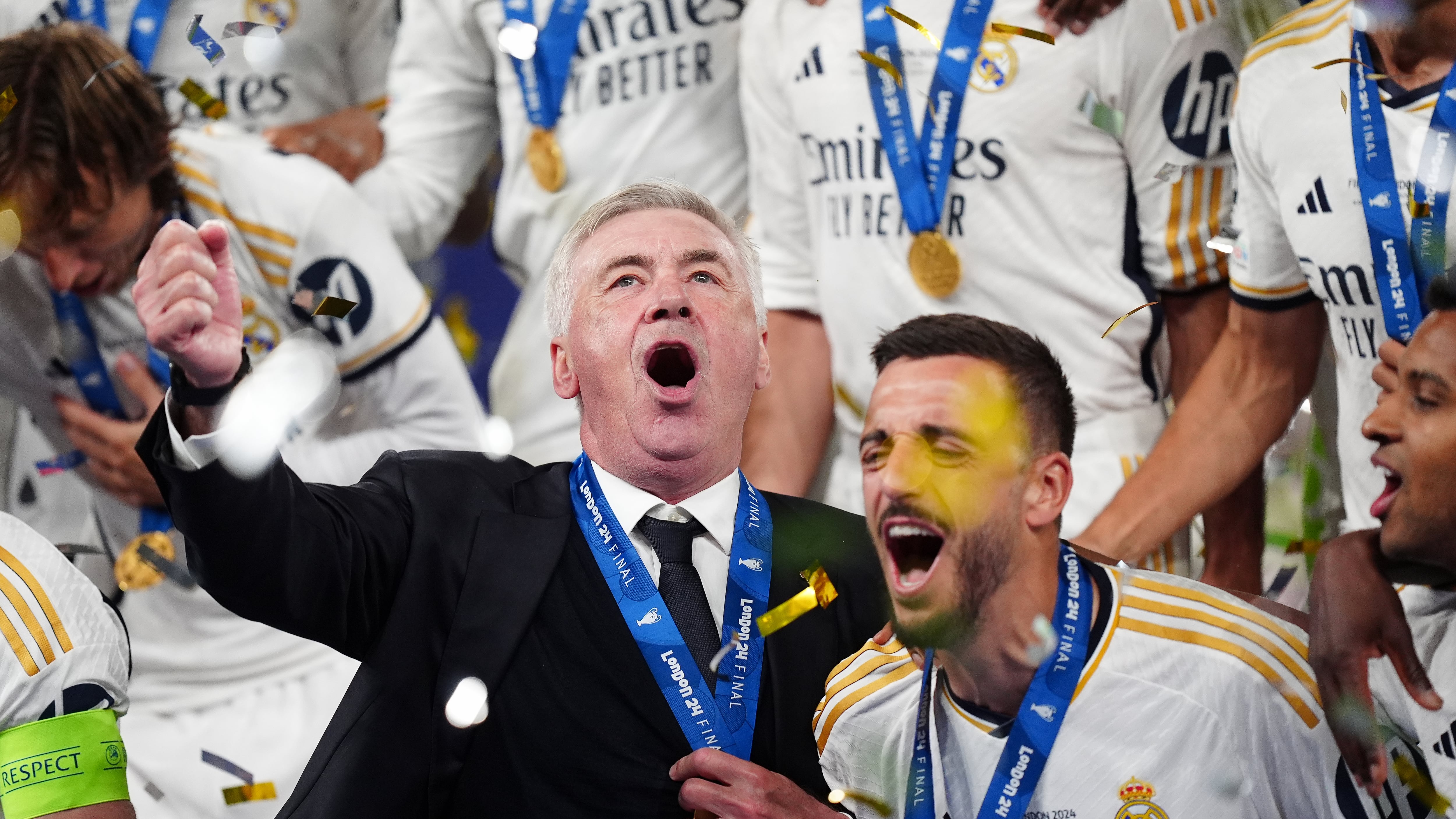 Carlo Ancelotti celebrates Real Madrid’s Champions League win with his players