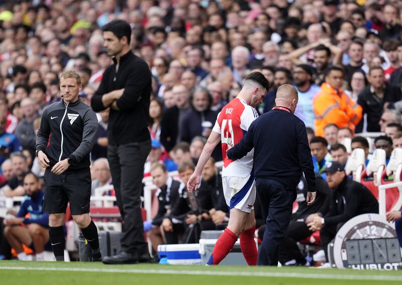 Declan Rice leaves the field after being sent off in Arsenal’s draw with Brighton