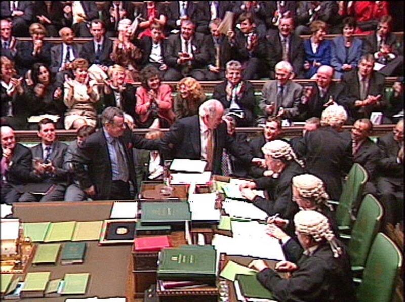 Michael Martin, centre, being ‘dragged’ to the Speaker’s chair by colleagues after being voted in as new House of Commons Speaker in 2000