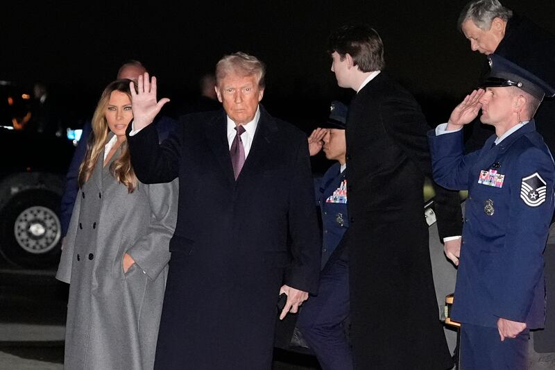 Donald Trump and his wife Melania after arriving in Washington (Alex Brandon/AP)