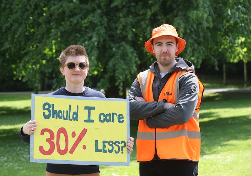 Ciara Greer junior doc in Lagan Valley hospital and Oisin Fearon from SWAH,  at Stormont in Belfast  in a dispute over pay.
The 48-hour full walkout runs from 07:00 BST on Thursday 6 June until 07:00 on Saturday 8 June.
PICTURE COLM LENAGHAN