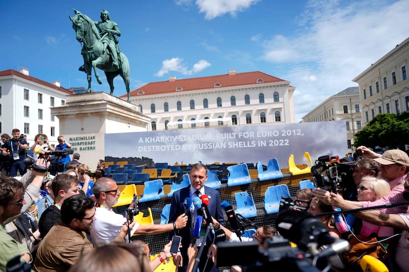 Andriy Shevchenko talks to journalists as he presents an installation ahead of the Group E match between Romania and Ukraine at the Euro 2024 soccer tournament in Munich (Ariel Schalit/AP)