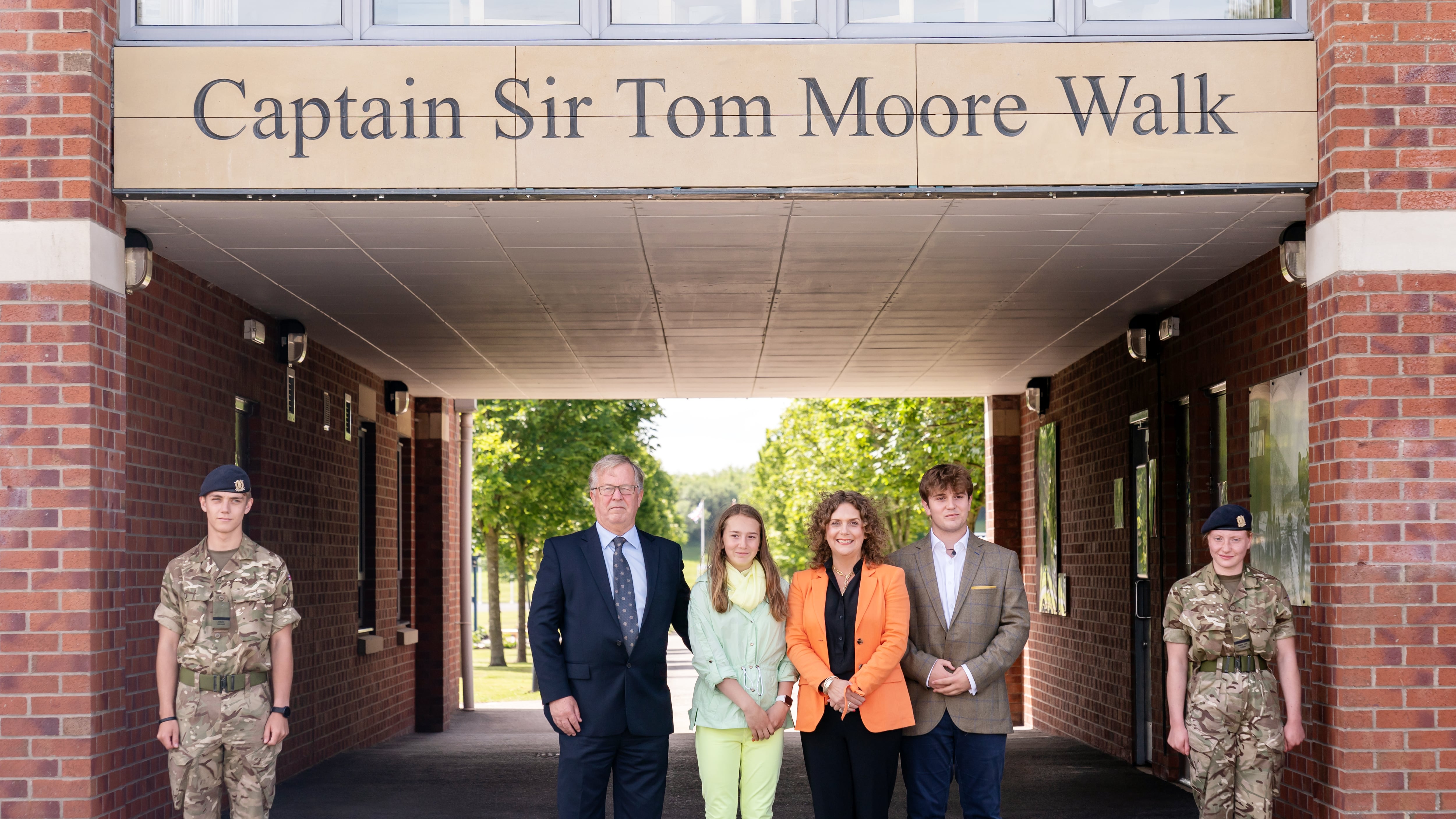 Colin Ingram-Moore (left) and Hannah Ingram-Moore (second from right) have been disqualified as charity trustees