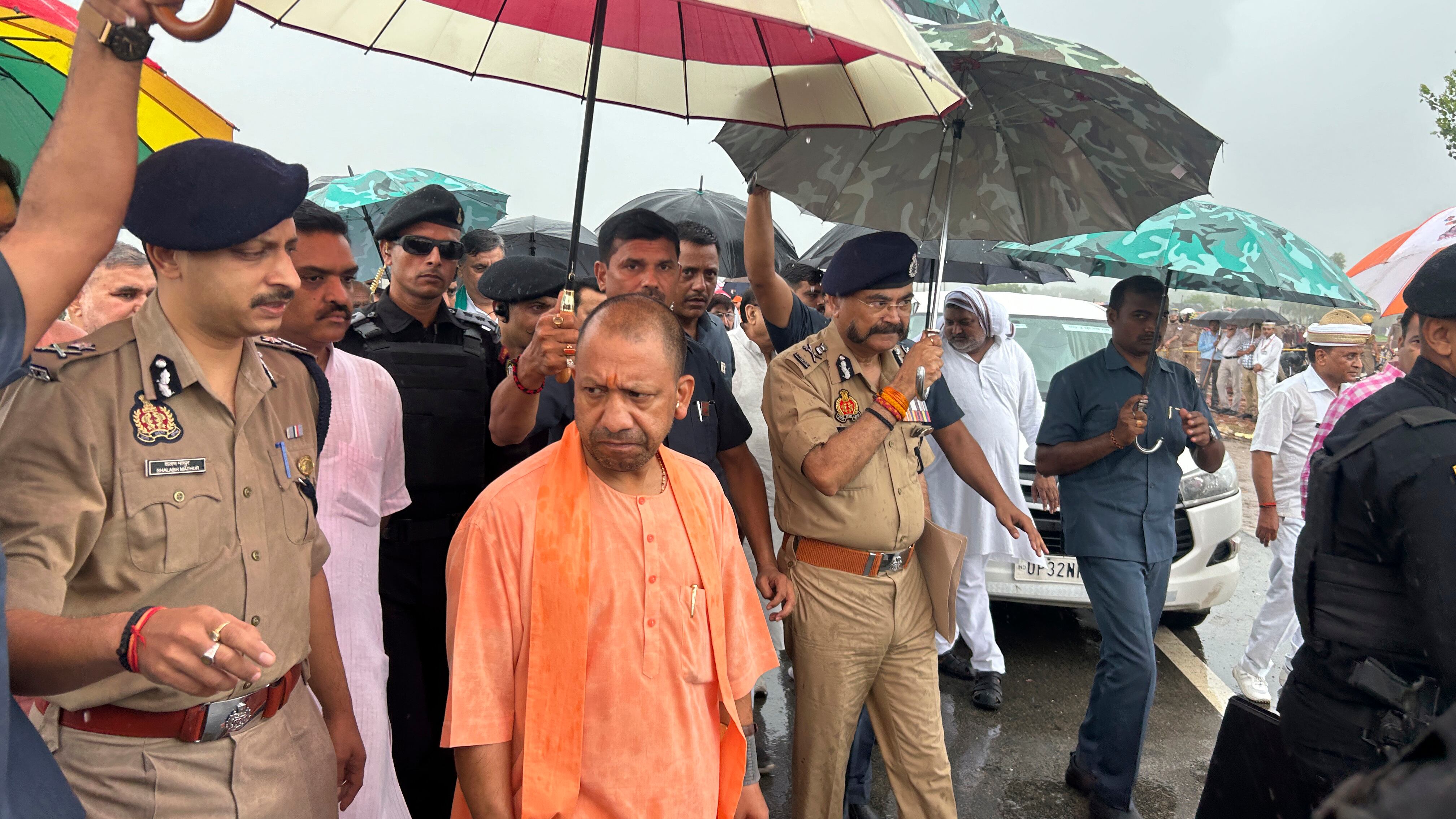 Uttar Pradesh State Chief Minister Yogi Adityanath visits the place where a fatal stampede took place in Fulrai village of Hathras district (Rajesh Kumar Singh/AP)
