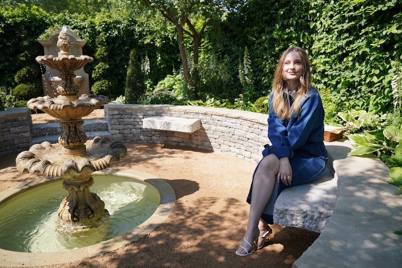 Cast member Hannah Dodd in the Bridgerton Garden