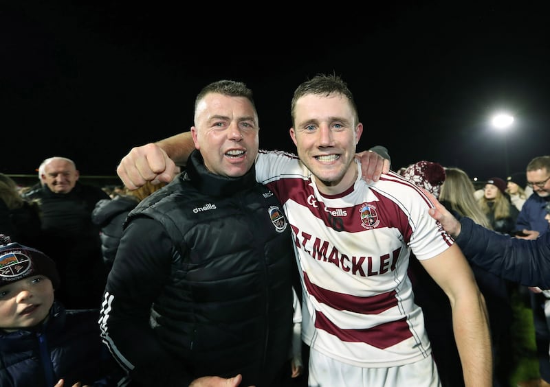 Paul McCormack celebrates with captain Mark McGuigan after Sleacht Néill's Ulster final victory over Portaferry. Picture by Margaret McLaughlin