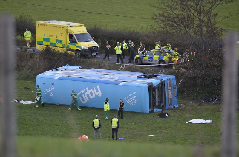 The double-decker bus carrying 43 pupils overturned in a field near Carrowdore, Co Down, on Monday