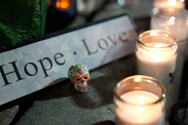 A memorial sits outside a restaurant along Bourbon Street in the French Quarter (George Walker IV/AP)