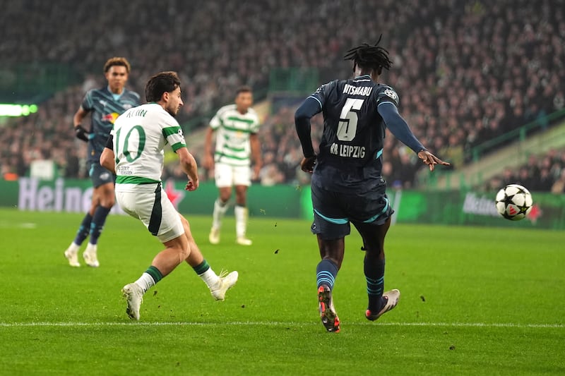 Nicolas Kuhn curls home Celtic’s equaliser in their win over RB Leipzig