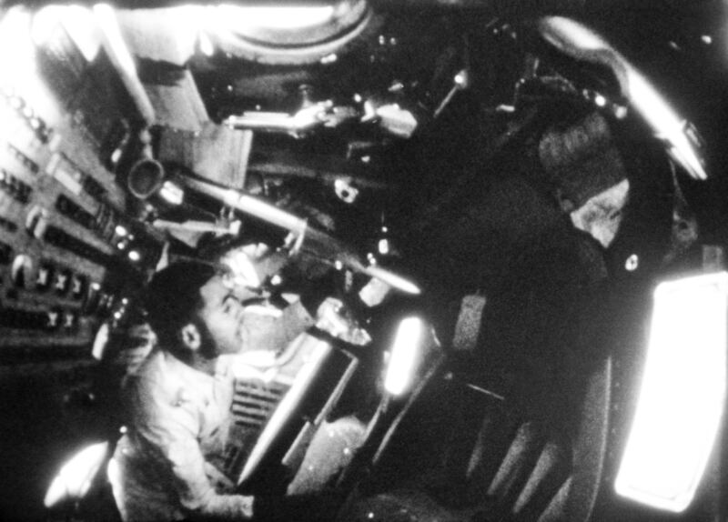 NASA photo show William Anders on board Apollo 8 (NASA/AP)