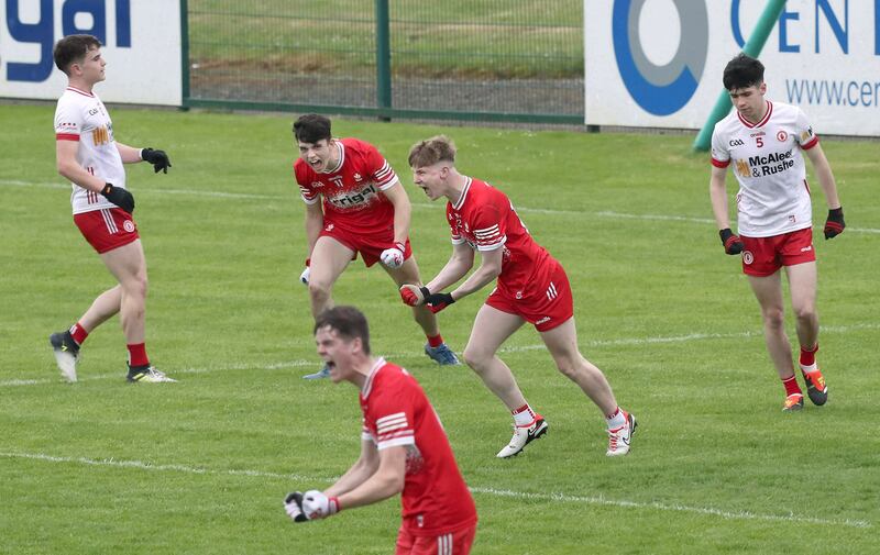 Caoimhin Hargan (centre) celebrates scoring Derry’s second goal during their Ulster MFC semi-final win over Tyrone at Owenbeg on Saturday