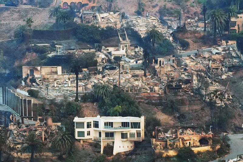 A house remains standing in the Pacific Palisades neighbourhood of Los Angeles (Mark J. Terrill/AP)