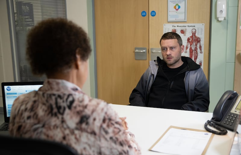 A scene from Coronation Street in which a neurologist tells Paul Foreman, played by Peter Ash, that he is showing symptoms of motor neurone disease