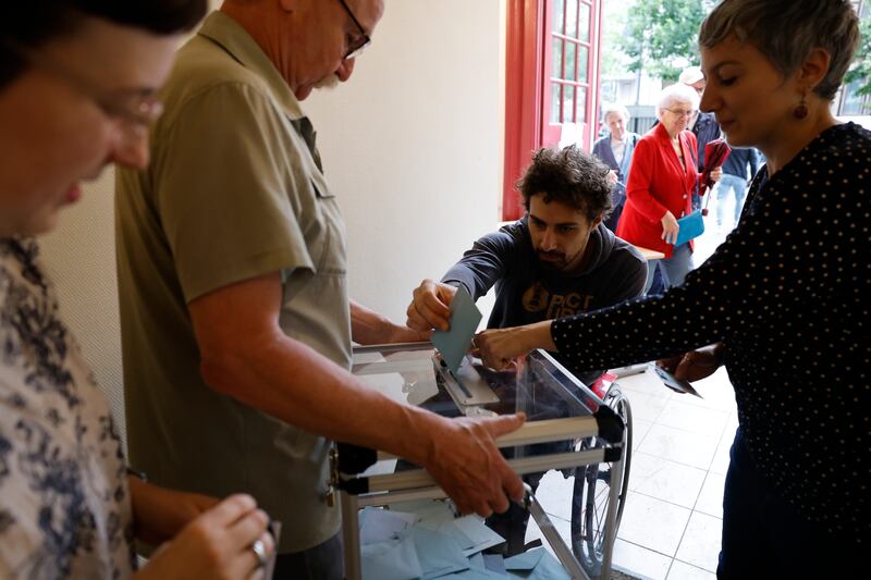 A man casts his ballot in Strasbourg, eastern France (Jean-Francois Badias/AP)