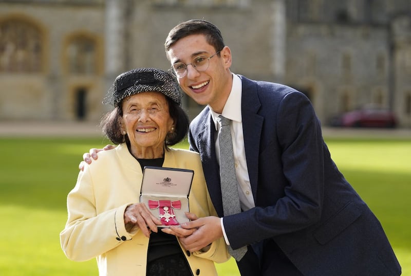 Holocaust survivor Lily Ebert, left, poses for a photograph with her great-grandson Dov Forman