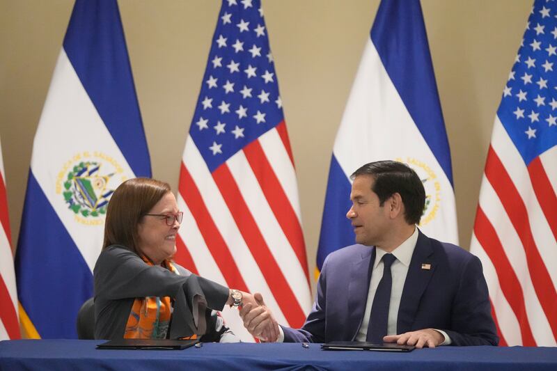 Secretary of state Marco Rubio, right, and El Salvador’s foreign minister Alexandra Hill Tinoco shake hands after signing a memorandum of understanding regarding civil nuclear cooperation between their countries (AP Photo/Mark Schiefelbein, Pool)