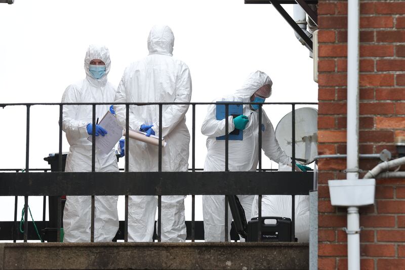 Forensics at the scene as  A man, aged in his 20s, is in a serious condition in hospital after he was found seriously injured in a property in the Queens Avenue area of Newtownabbey on Tuesday evening, 11th June.
PICTURE COLM LENAGHAN