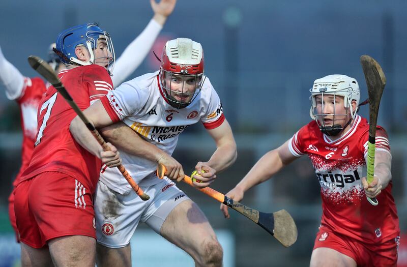 Derry Meehaul McGrath and Richie Mullan with Fionn Devlin of Tyrone during the National Hurling League Div 2b Final played at Owenbeg on Saturday 30th March 2024. Picture Margaret McLaughlin