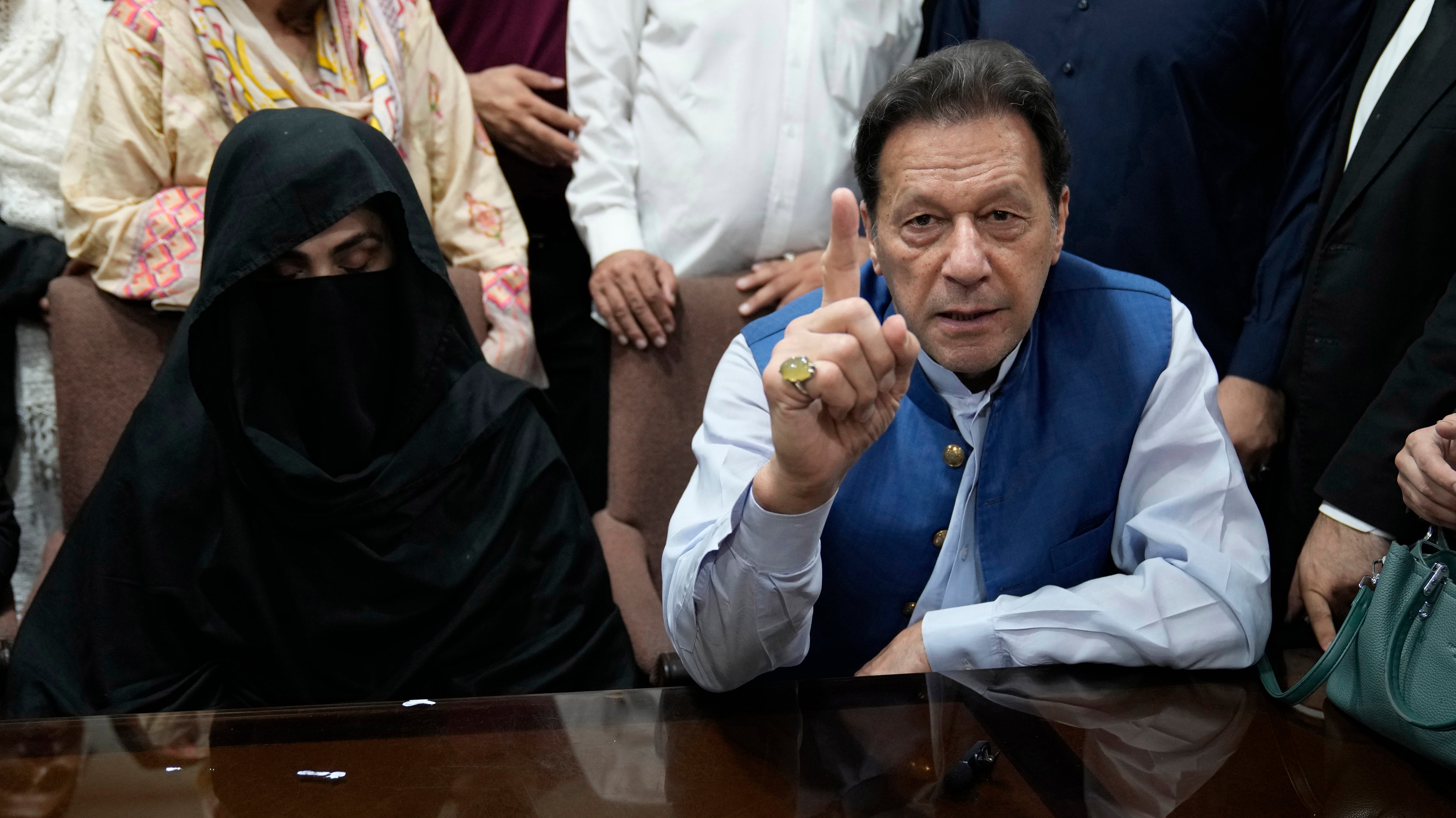 Imran Khan and his wife Bushra Bibi (KM Chaudary/AP)
